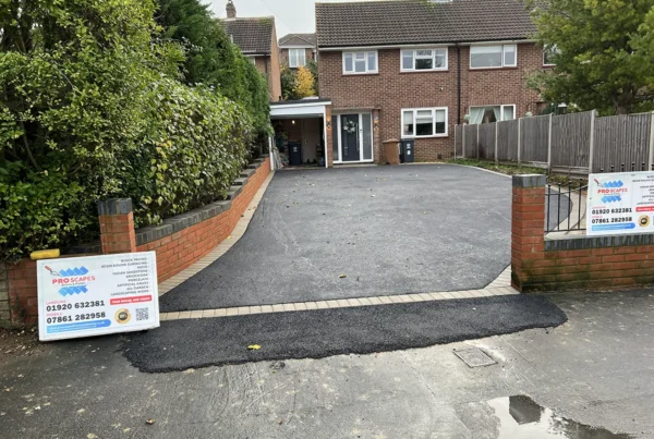 Tarmac & Asphalt Driveway with Wall installation
