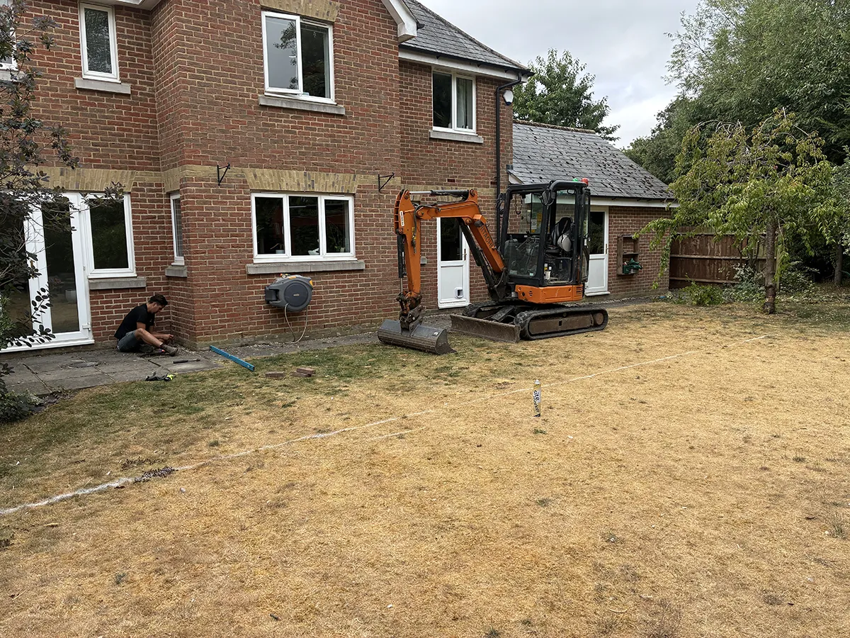 Porcelain patio and Marshalls charcoal block paving driveway with granite gravel, installed by Pro Scapes Porcelain patio and Marshalls charcoal block paving driveway with granite gravel, installed by Pro Scapes